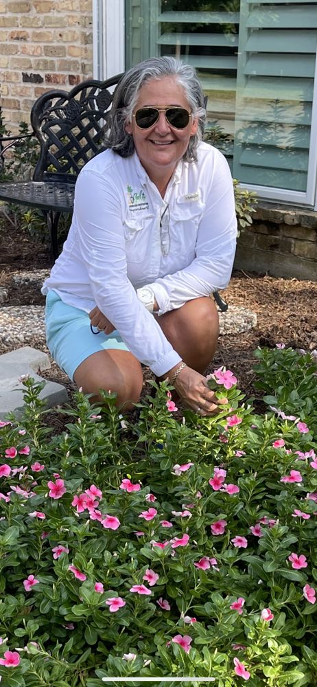 2 Gals landscaping founder showcasing beautiful garden design in Houston